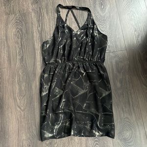 Black dress with metallic pattern